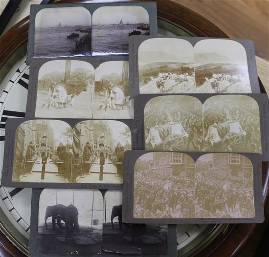 Two stereo viewers and a collection of stereo cards